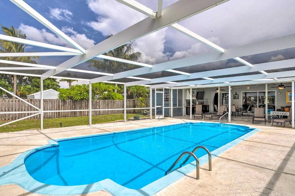 Tropical Landing Stuart Home with Pool and Grill!
